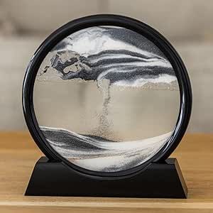 A Mindful Office Moving Sand Art Decor (7 Inch Black Frame) - Perpetual Motion Desk Toy Brings Relaxing Vibe Round Glass Frame with Black, White and Gold Liquid